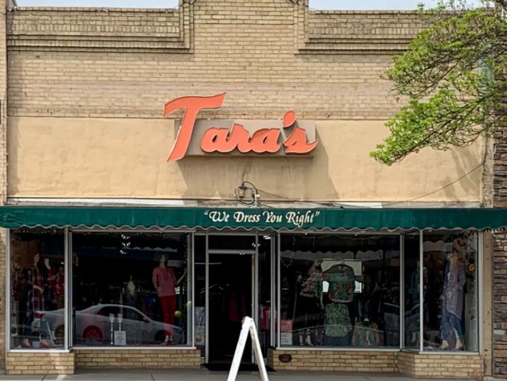 Tara's storefront on Main Street, Delta, Colorado, with the We Dress You Right awning